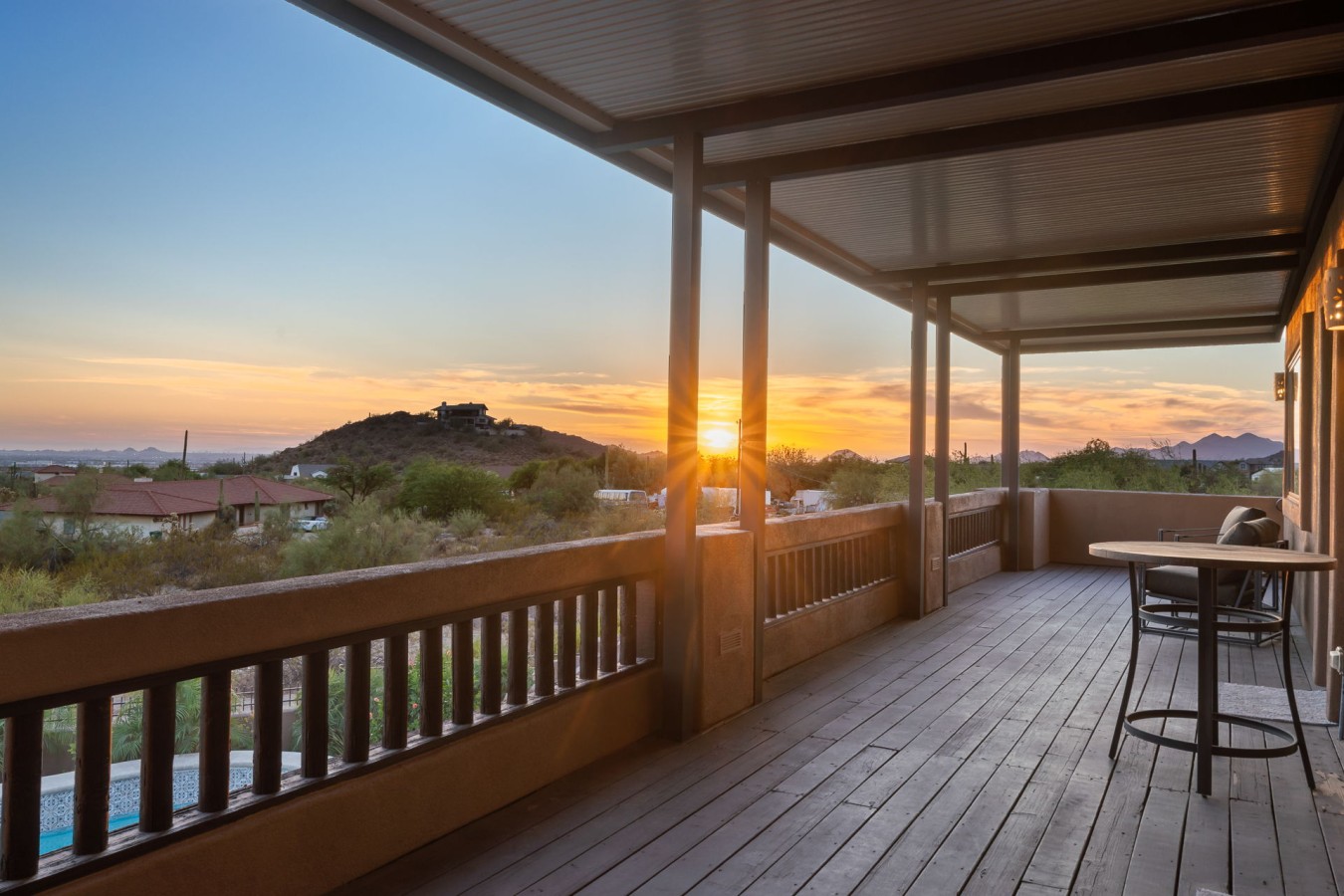 Balcony overlooking the desert at sunset