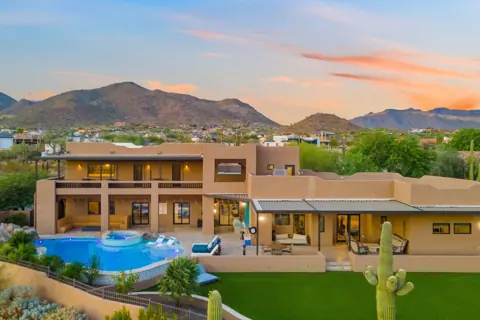 Sunset views over the pool and patio