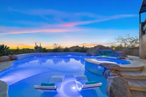 Pool lights glow for evening swims