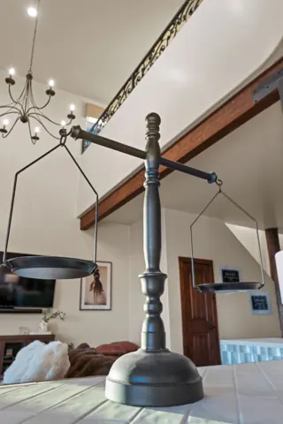 Statement staircase and chandelier detail