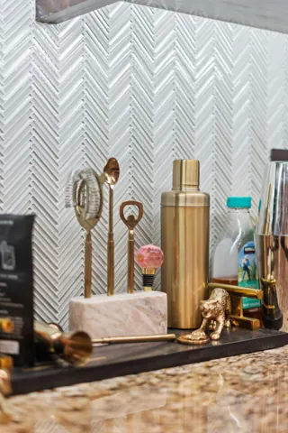 Clean bathroom tile and amenity detail