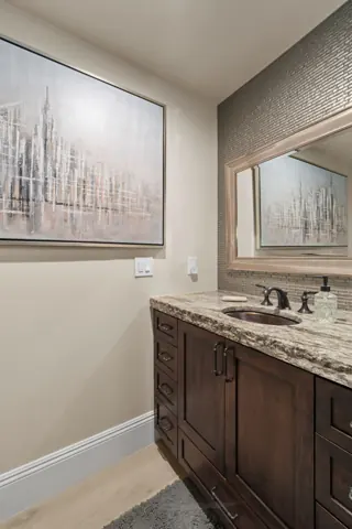 Bathroom vanity and built-in towel shelves