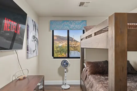 Bright bunk room with fun desert style