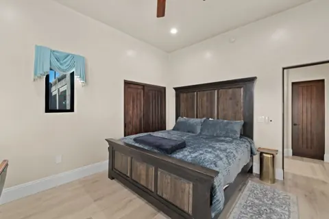 Peaceful guest bedroom with plenty of storage