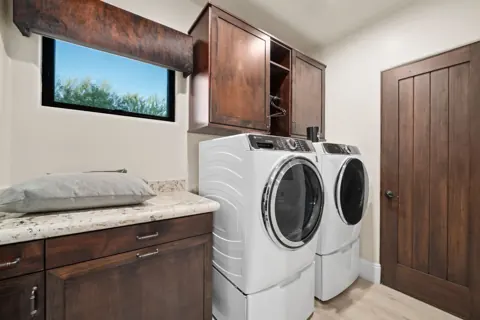 Laundry room with washer and dryer