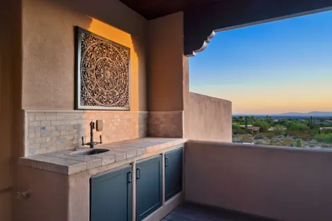 Outdoor bar area with mountain views