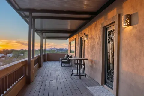 Covered balcony seating with scenic views