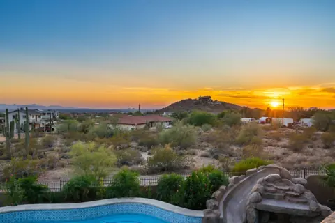 Desert sunset over the surrounding hills