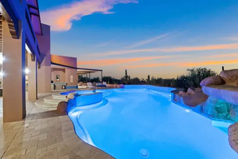 Night swim views under the desert sky