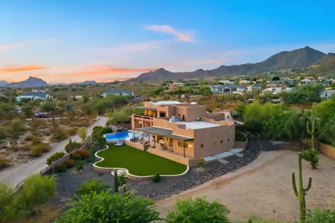 Aerial view showing the full property setting