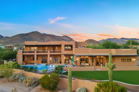 Expansive backyard with pool and outdoor lounge space