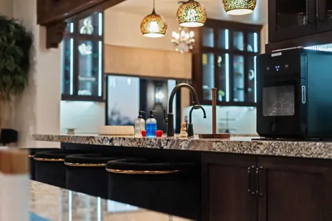 Beautiful kitchen lighting over the island