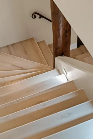 Staircase detail with warm wood tones