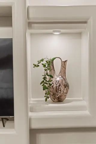 Bathroom storage and decorative vase