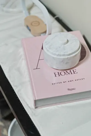 Bedside book and decorative candle