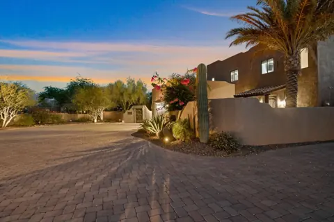 Private desert-style driveway entrance