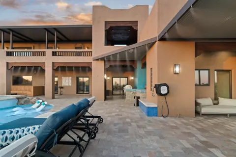 Covered patio overlooking the pool