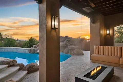 Warm patio lighting with desert views