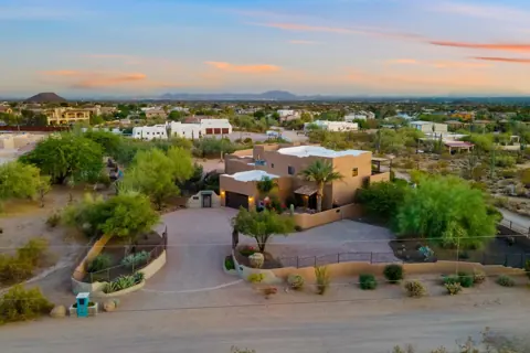 Drone view of the home and private driveway