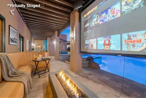 Outdoor movie area — virtually staged listing photo