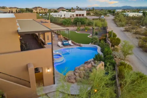 Aerial view of the pool and desert landscaping