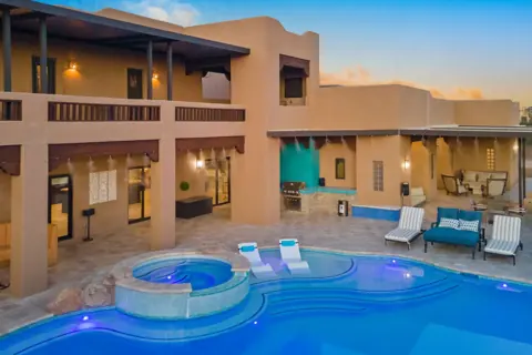 Poolside lounge area with desert resort style