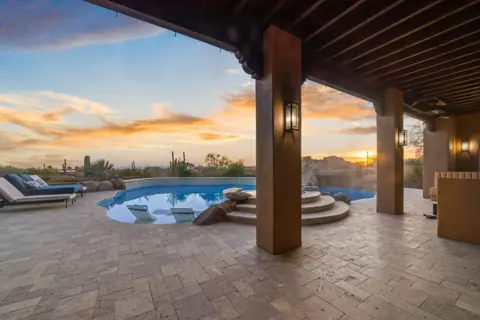 Patio lounge overlooking the spa and pool